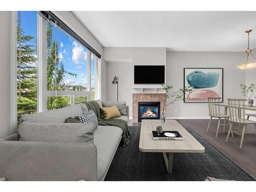 19 Kincora Heath Nw, Calgary, AB - Indoor Photo Showing Living Room With Fireplace