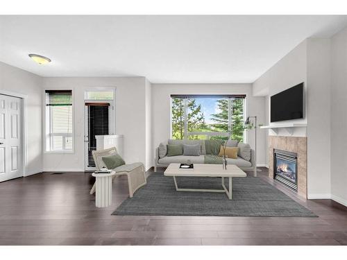 19 Kincora Heath Nw, Calgary, AB - Indoor Photo Showing Living Room With Fireplace