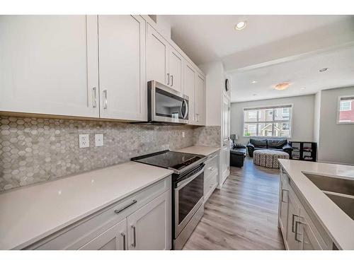 603-355 Nolancrest Heights, Calgary, AB - Indoor Photo Showing Kitchen With Upgraded Kitchen