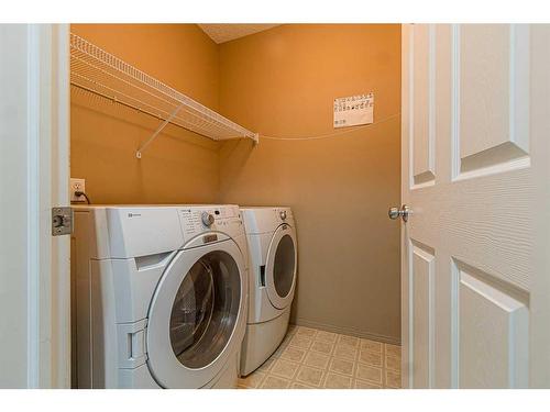 128 Country Village Cape Ne, Calgary, AB - Indoor Photo Showing Laundry Room