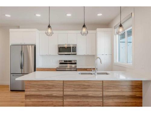 19671 48 Street Se, Calgary, AB - Indoor Photo Showing Kitchen With Stainless Steel Kitchen With Double Sink With Upgraded Kitchen