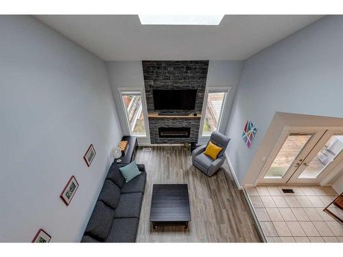 7828 Ranchview Drive Nw, Calgary, AB - Indoor With Fireplace