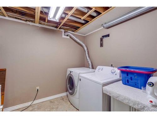 7828 Ranchview Drive Nw, Calgary, AB - Indoor Photo Showing Laundry Room