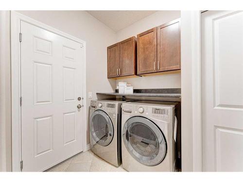 12481 Crestmont Boulevard Sw, Calgary, AB - Indoor Photo Showing Laundry Room