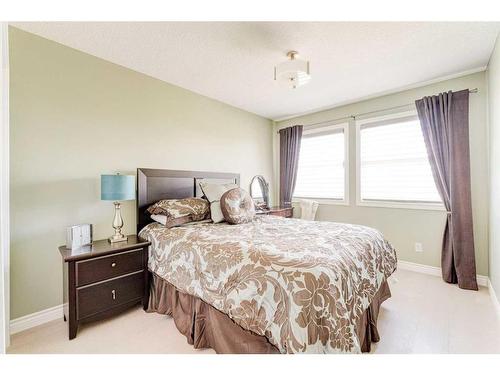 12481 Crestmont Boulevard Sw, Calgary, AB - Indoor Photo Showing Bedroom