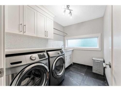 1220 Gladstone Road Nw, Calgary, AB - Indoor Photo Showing Laundry Room