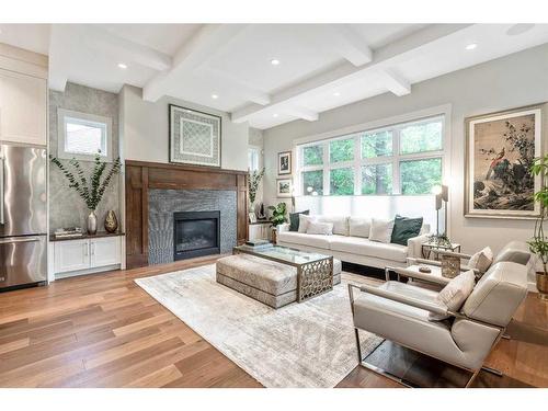 1220 Gladstone Road Nw, Calgary, AB - Indoor Photo Showing Living Room With Fireplace