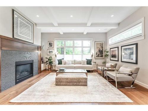 1220 Gladstone Road Nw, Calgary, AB - Indoor Photo Showing Living Room With Fireplace