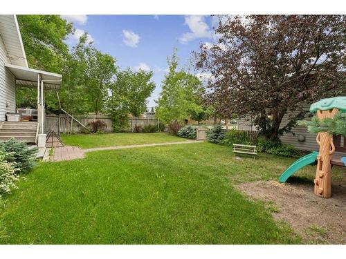 2044 51 Avenue Sw, Calgary, AB - Outdoor With Backyard