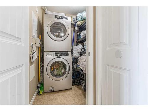 1306-175 Panatella Hill Nw, Calgary, AB - Indoor Photo Showing Laundry Room