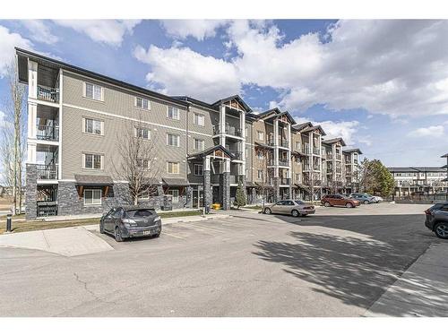 1306-175 Panatella Hill Nw, Calgary, AB - Outdoor With Balcony With Facade