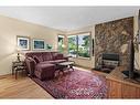 177 Macewan Glen Drive Nw, Calgary, AB  - Indoor Photo Showing Living Room With Fireplace 