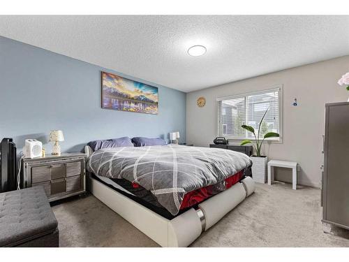 18 Evanscrest Terrace Nw, Calgary, AB - Indoor Photo Showing Bedroom