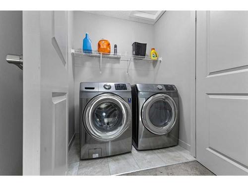 18 Evanscrest Terrace Nw, Calgary, AB - Indoor Photo Showing Laundry Room