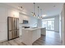 303-200 Auburn Meadows Common Se, Calgary, AB  - Indoor Photo Showing Kitchen With Stainless Steel Kitchen With Upgraded Kitchen 