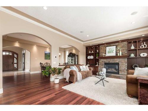 227 Aspen Ridge Place Sw, Calgary, AB - Indoor Photo Showing Living Room With Fireplace