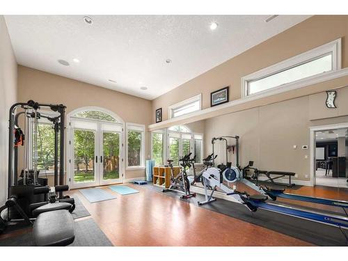 227 Aspen Ridge Place Sw, Calgary, AB - Indoor Photo Showing Gym Room