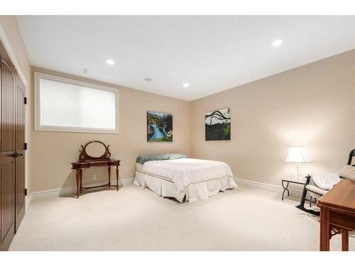 227 Aspen Ridge Place Sw, Calgary, AB - Indoor Photo Showing Bedroom