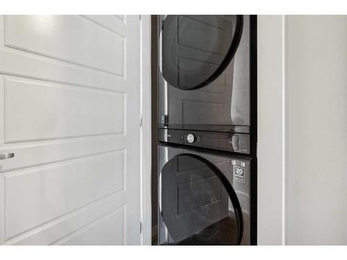 602 Cranford Mews Se, Calgary, AB - Indoor Photo Showing Laundry Room