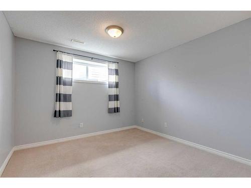220 Chapala Drive Se, Calgary, AB - Indoor Photo Showing Other Room