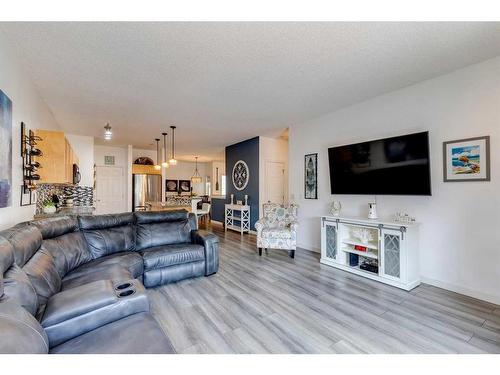 220 Chapala Drive Se, Calgary, AB - Indoor Photo Showing Living Room