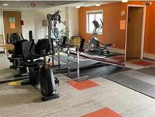 315-5204 Dalton Drive Nw, Calgary, AB - Indoor Photo Showing Gym Room