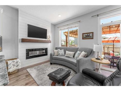 20 Legacy Glen View Se, Calgary, AB - Indoor Photo Showing Living Room With Fireplace