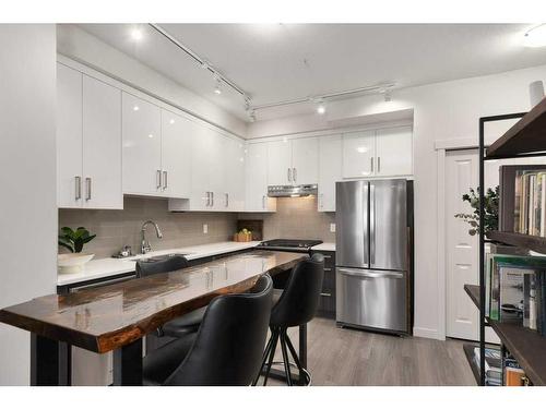 208 Sherwood Lane Nw, Calgary, AB - Indoor Photo Showing Kitchen With Stainless Steel Kitchen