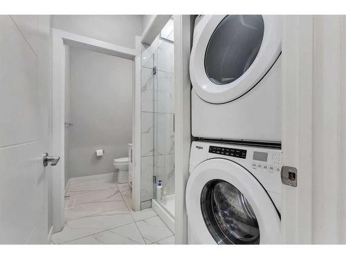 24 Saddlestone Way, Calgary, AB - Indoor Photo Showing Laundry Room