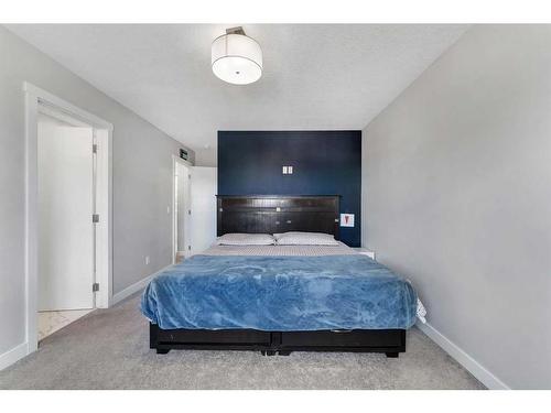24 Saddlestone Way, Calgary, AB - Indoor Photo Showing Bedroom