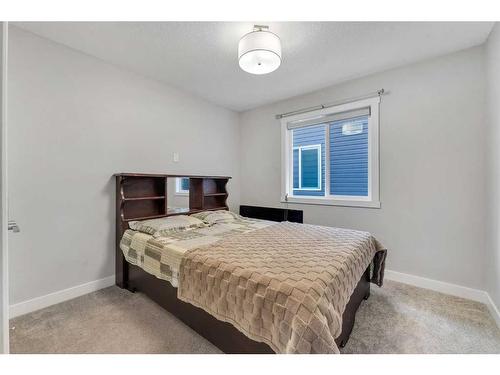 24 Saddlestone Way, Calgary, AB - Indoor Photo Showing Bedroom