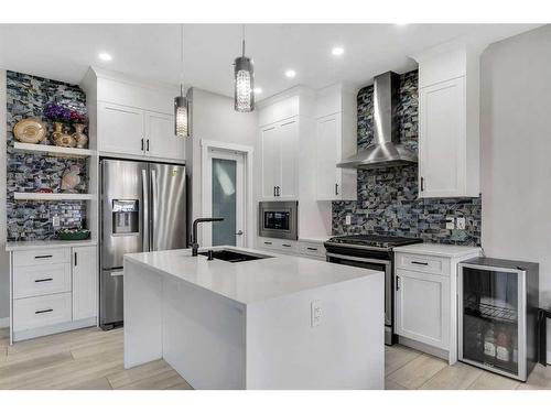 24 Saddlestone Way, Calgary, AB - Indoor Photo Showing Kitchen With Upgraded Kitchen