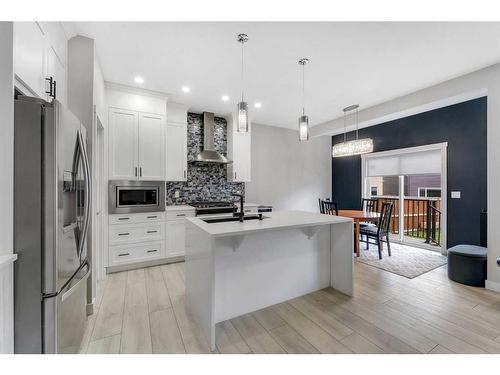 24 Saddlestone Way, Calgary, AB - Indoor Photo Showing Kitchen With Upgraded Kitchen