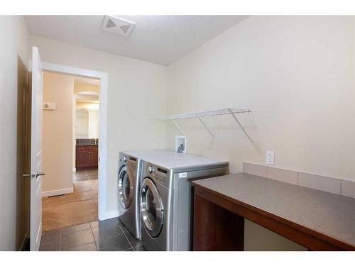 74 Elgin Park Road Se, Calgary, AB - Indoor Photo Showing Laundry Room