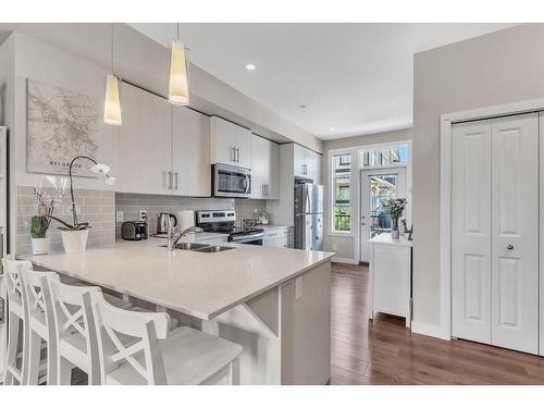 1671 Legacy Circle Se, Calgary, AB - Indoor Photo Showing Kitchen With Double Sink With Upgraded Kitchen