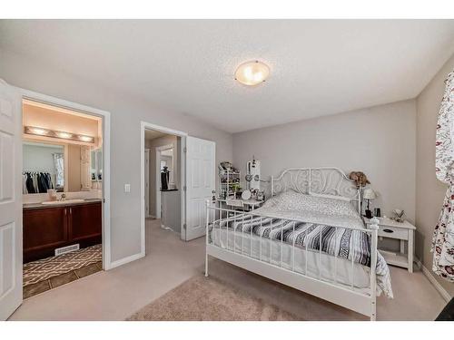 109 Cougar Plateau Mews Sw, Calgary, AB - Indoor Photo Showing Bedroom