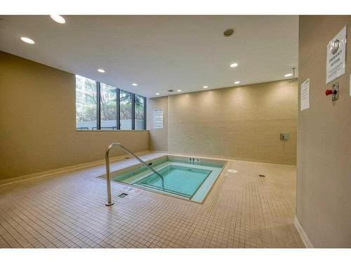 404-128 2 Street Sw, Calgary, AB - Indoor Photo Showing Other Room With In Ground Pool