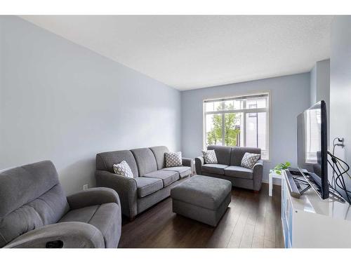 101 Copperpond Row Se, Calgary, AB - Indoor Photo Showing Living Room