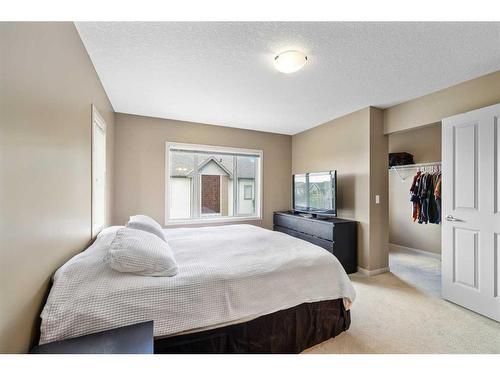 101 Copperpond Row Se, Calgary, AB - Indoor Photo Showing Bedroom