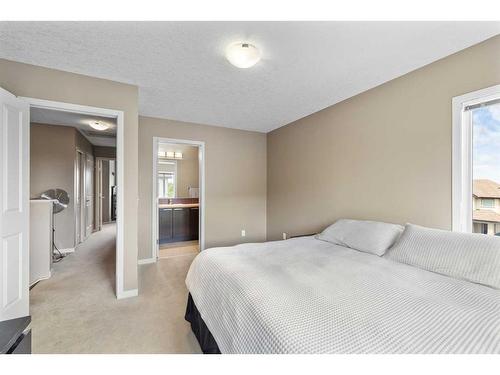 101 Copperpond Row Se, Calgary, AB - Indoor Photo Showing Bedroom