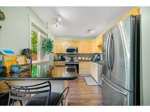 126 Pineset Place Ne, Calgary, AB - Indoor Photo Showing Kitchen With Stainless Steel Kitchen
