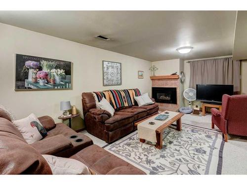 2823 Mackay Road Nw, Calgary, AB - Indoor Photo Showing Living Room With Fireplace