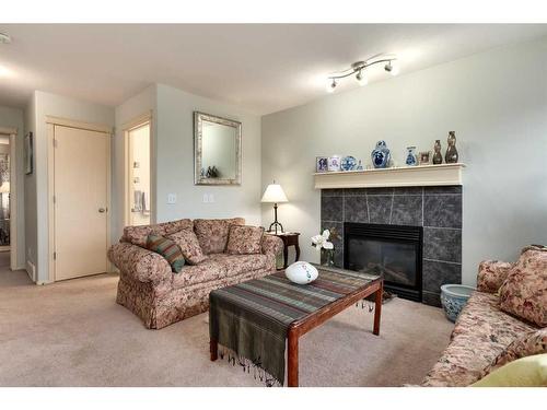 18 Valley Crest Close Nw, Calgary, AB - Indoor Photo Showing Living Room With Fireplace