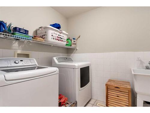 18 Valley Crest Close Nw, Calgary, AB - Indoor Photo Showing Laundry Room