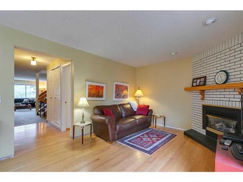 812 Edgemont Road Nw, Calgary, AB - Indoor Photo Showing Living Room With Fireplace