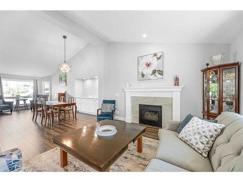 129 Sceptre Court Nw, Calgary, AB - Indoor Photo Showing Living Room With Fireplace