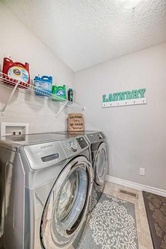 7916 Masters Boulevard Se, Calgary, AB - Indoor Photo Showing Laundry Room
