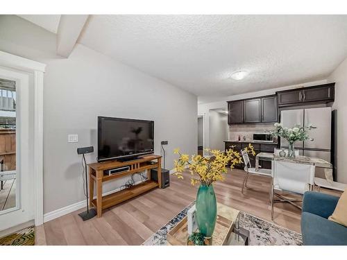 7916 Masters Boulevard Se, Calgary, AB - Indoor Photo Showing Living Room