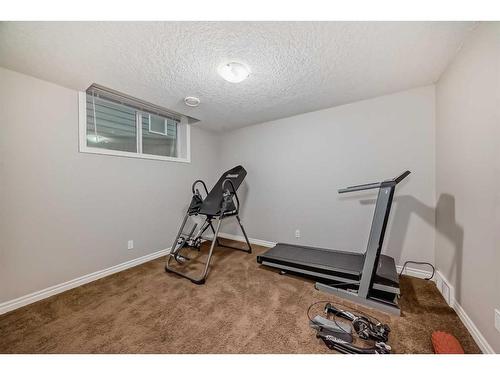 7916 Masters Boulevard Se, Calgary, AB - Indoor Photo Showing Gym Room