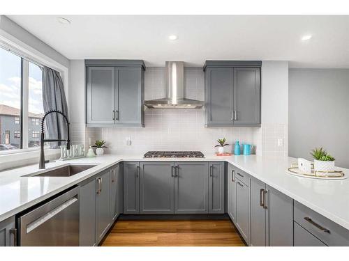 133 Magnolia Terrace Se, Calgary, AB - Indoor Photo Showing Kitchen With Upgraded Kitchen